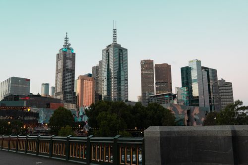 Free Dramatic view of Melbourne's skyline featuring modern skyscrapers during sunset. Stock Photo