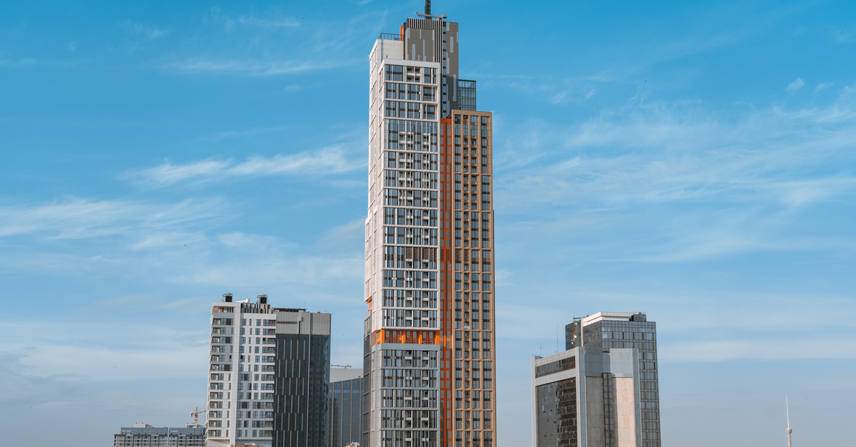 A stunning view of Tashkent's modern skyscrapers under a clear blue sky.