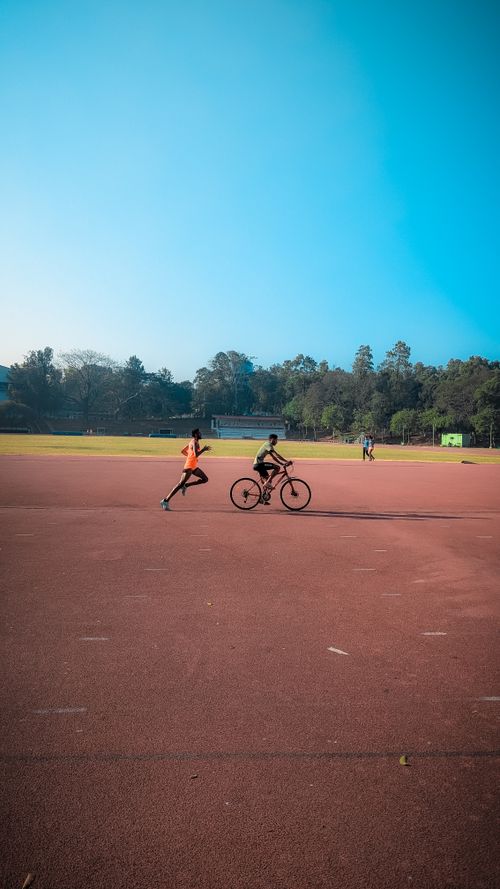 Free stock photo of athlete, bicycle, curved track Stock Photo