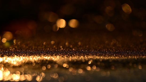 A mesmerizing abstract image featuring golden bokeh and sparkling lights creating a warm and enchanting atmosphere.