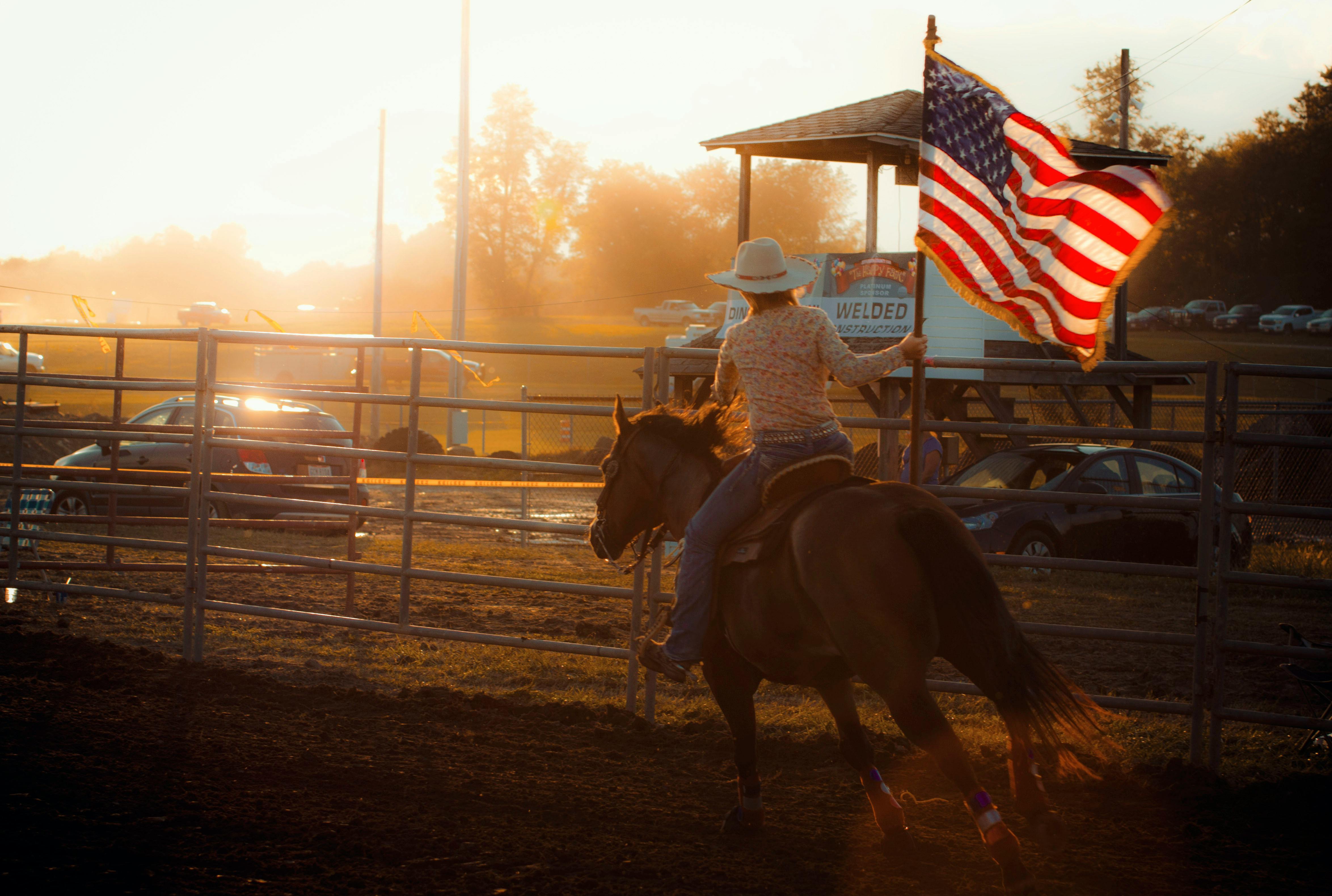Free stock photo of American flag, country, cowgirl