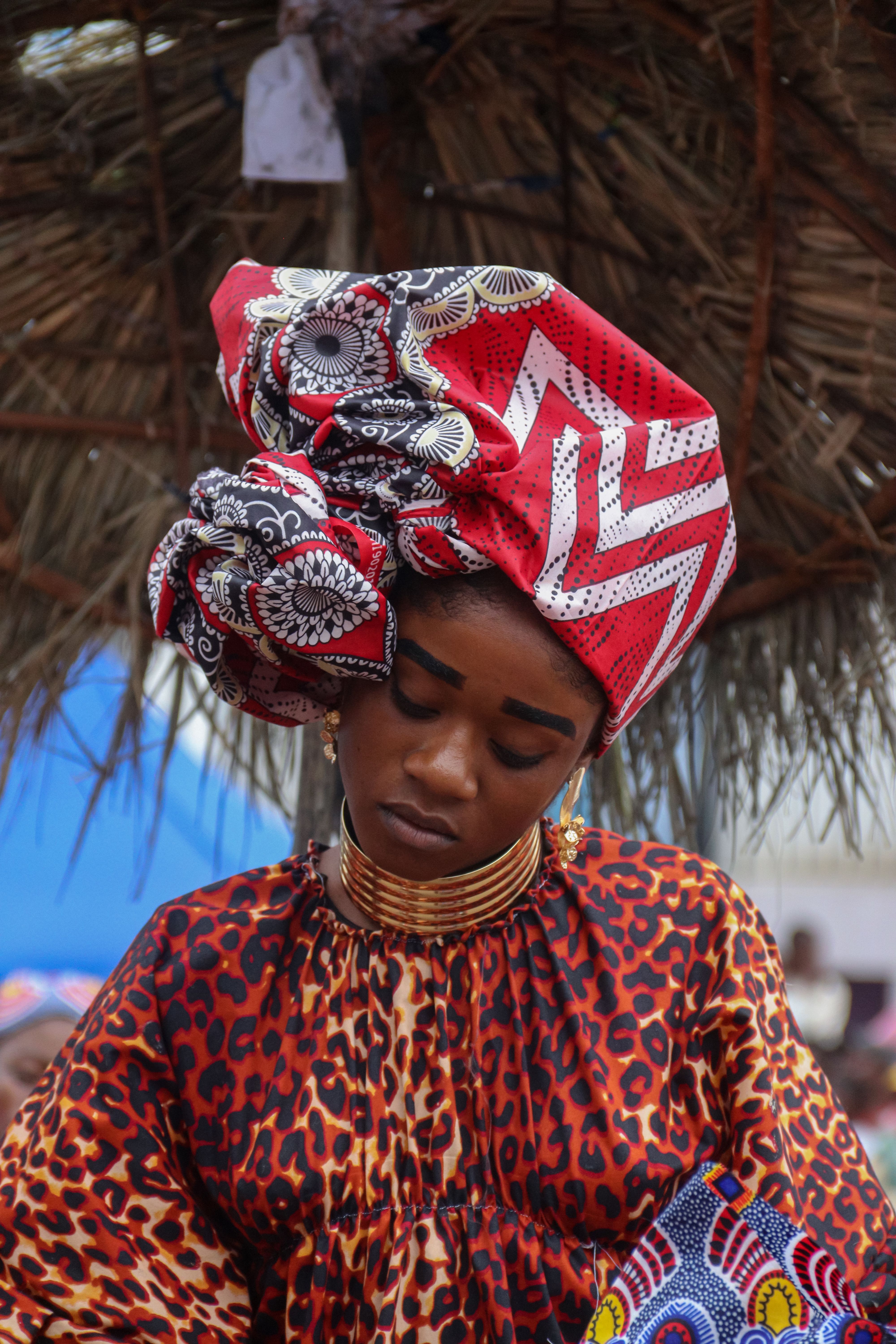 Traditional Angolan Attire with Vibrant Headdress · Free Stock Photo