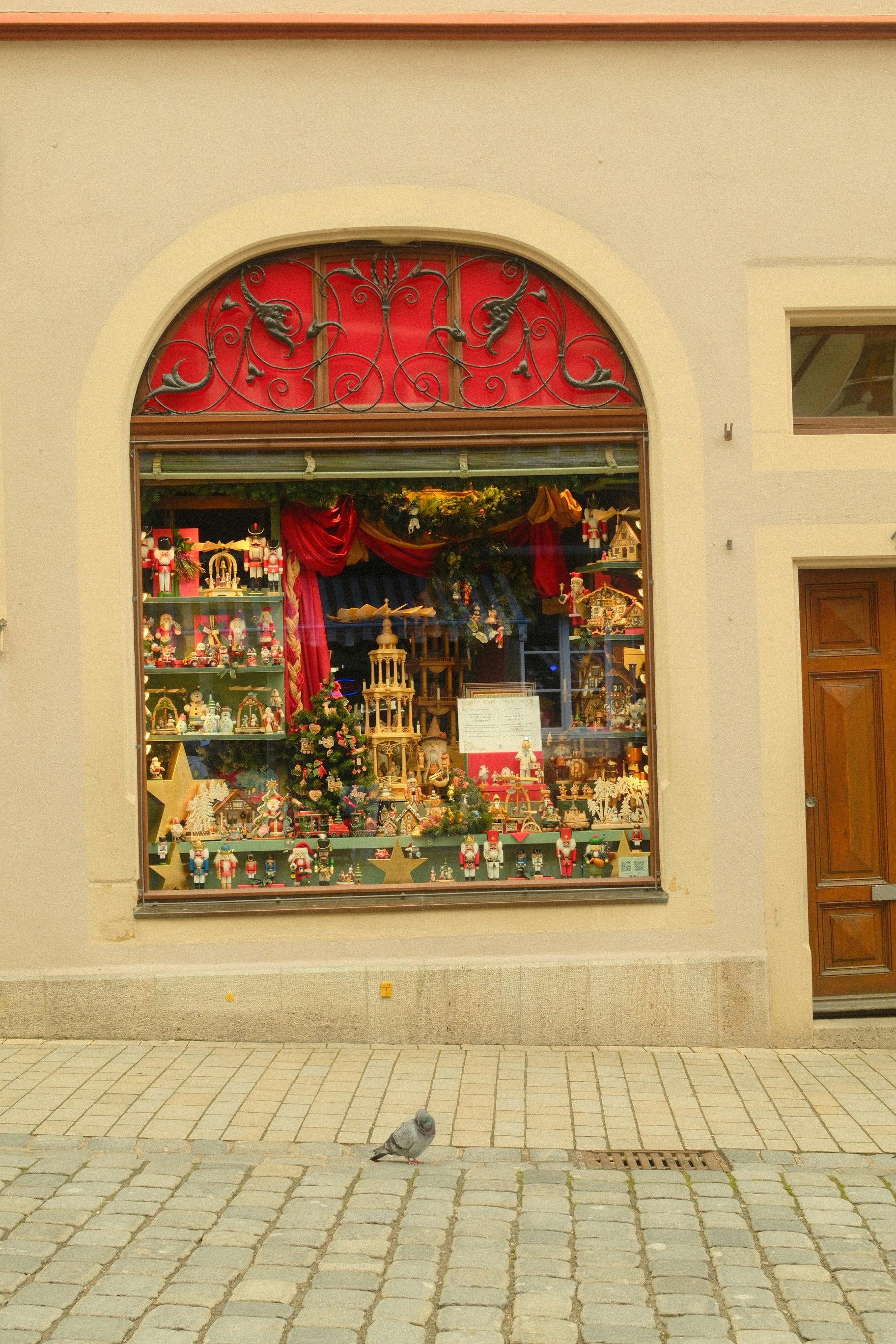 Festive window display with Christmas trinkets in Rothenburg-ob-der-Tauber, Bavaria.