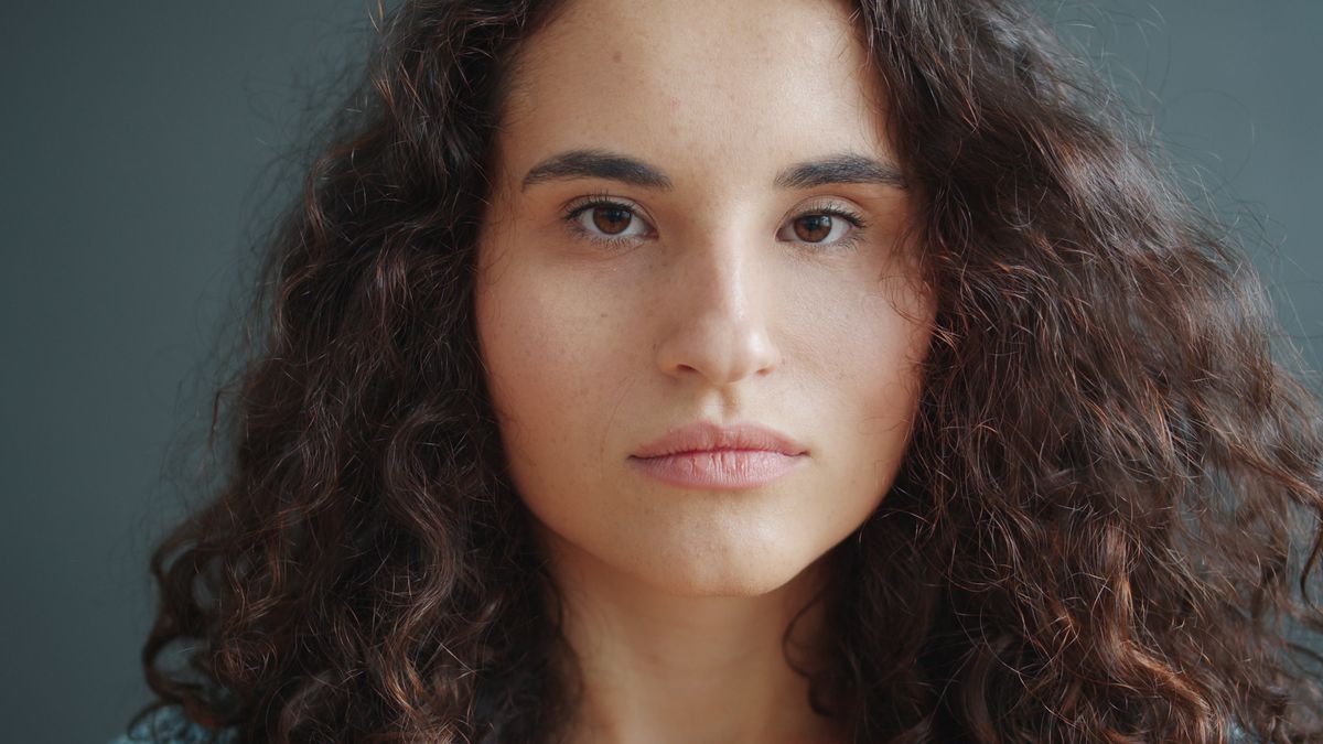 Portrait of a person with natural curly hair