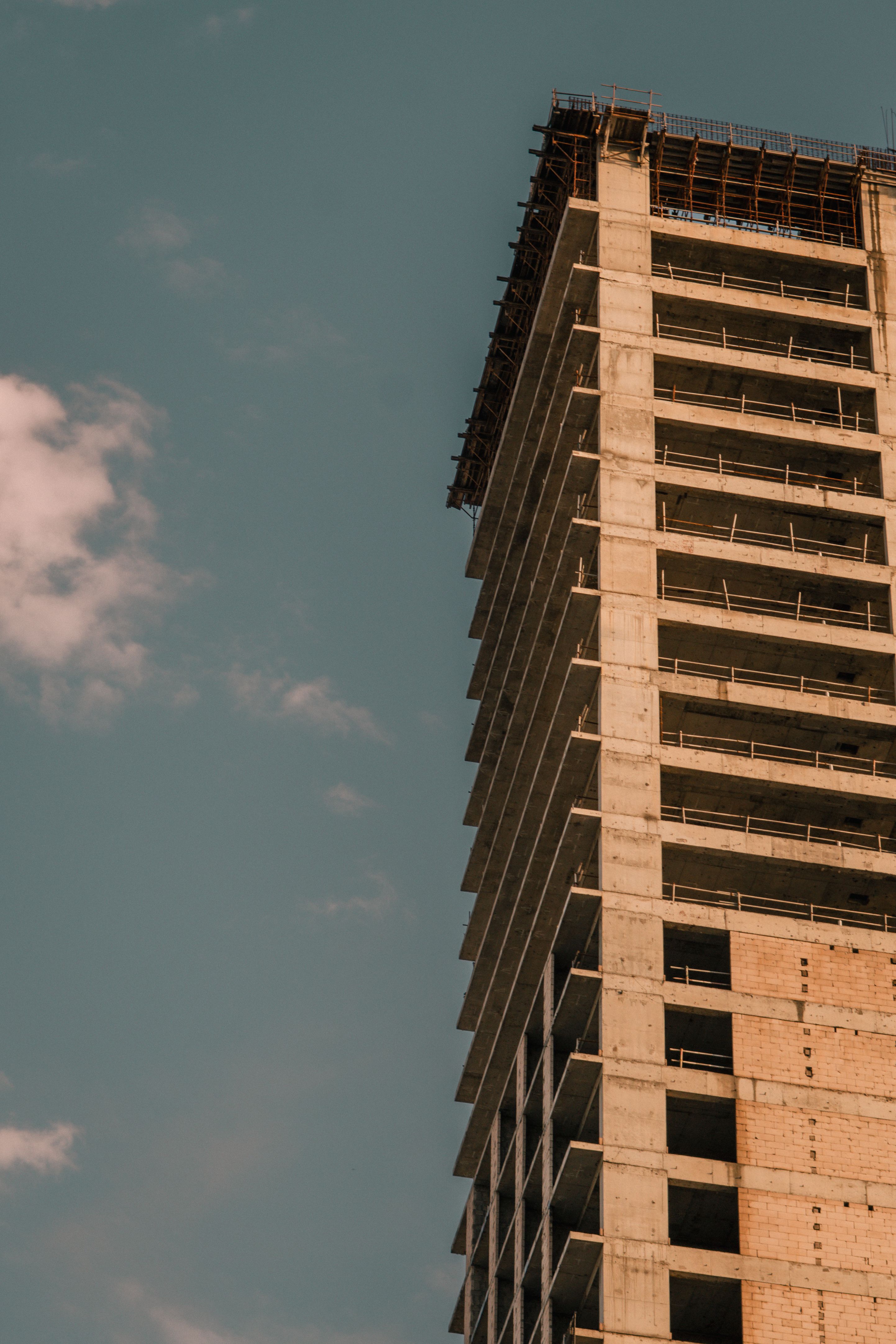 Modern high-rise building under construction — East Prowess Limited