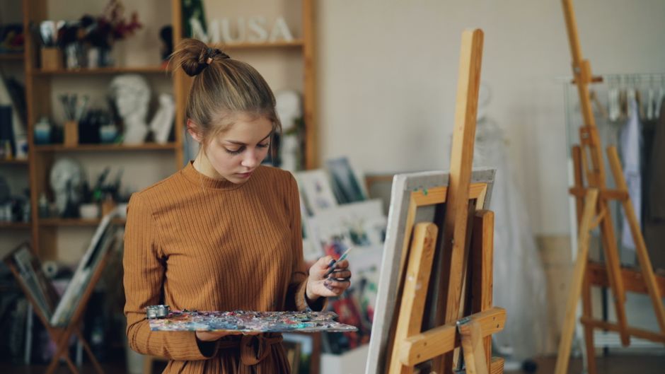 How Gap Insurance Covers Totaled Leased Cars and When You Need It Focused young female artist paints on canvas in an inspiring studio environment.