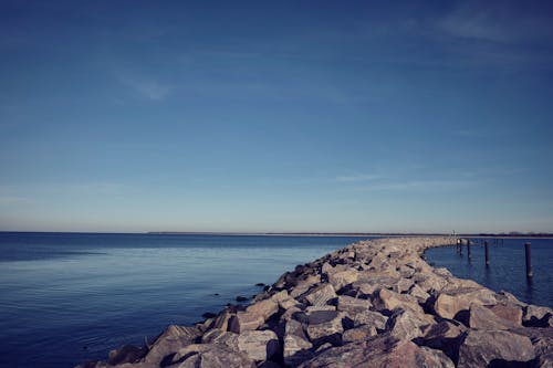 Free stock photo of baltic sea, blue skies, rock