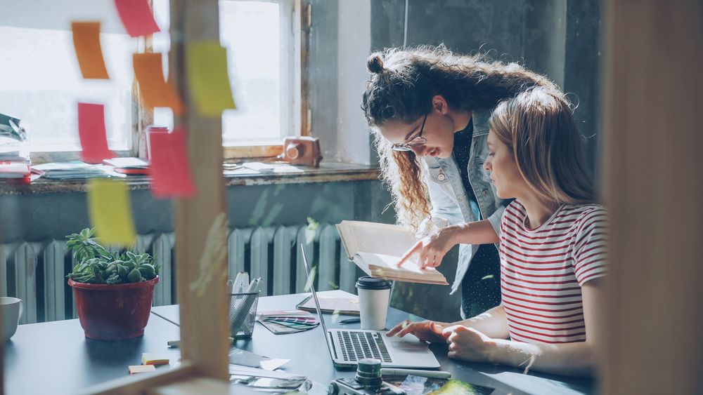 Small team collaborating at a table