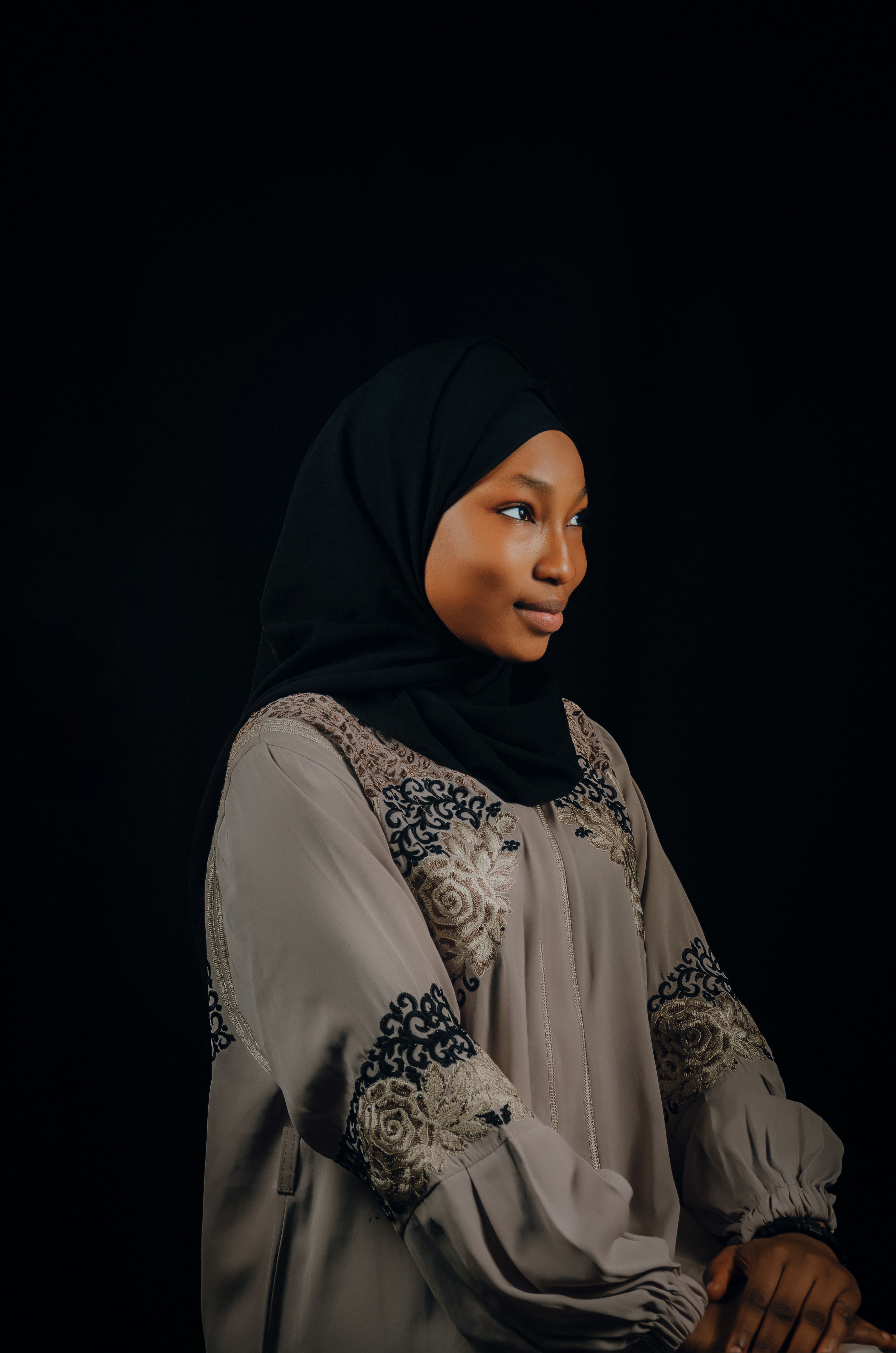 Elegant Portrait of Woman in Hijab with Dark Background · Free Stock Photo