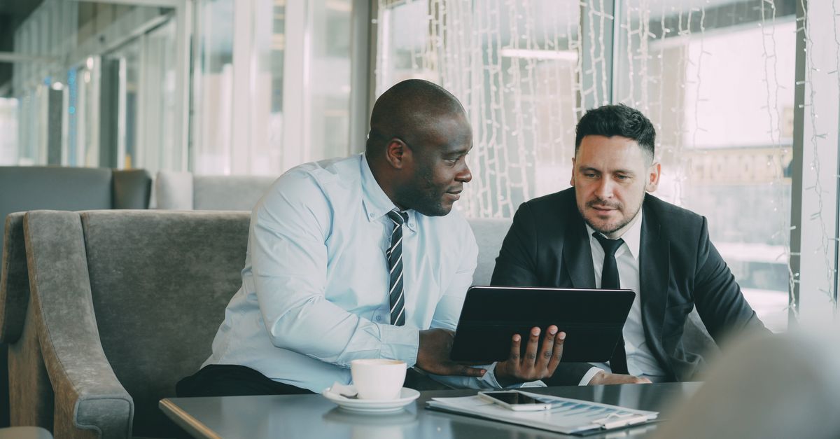 Senior business executive considering long-term retirement and key employee retention planning with professional guidance