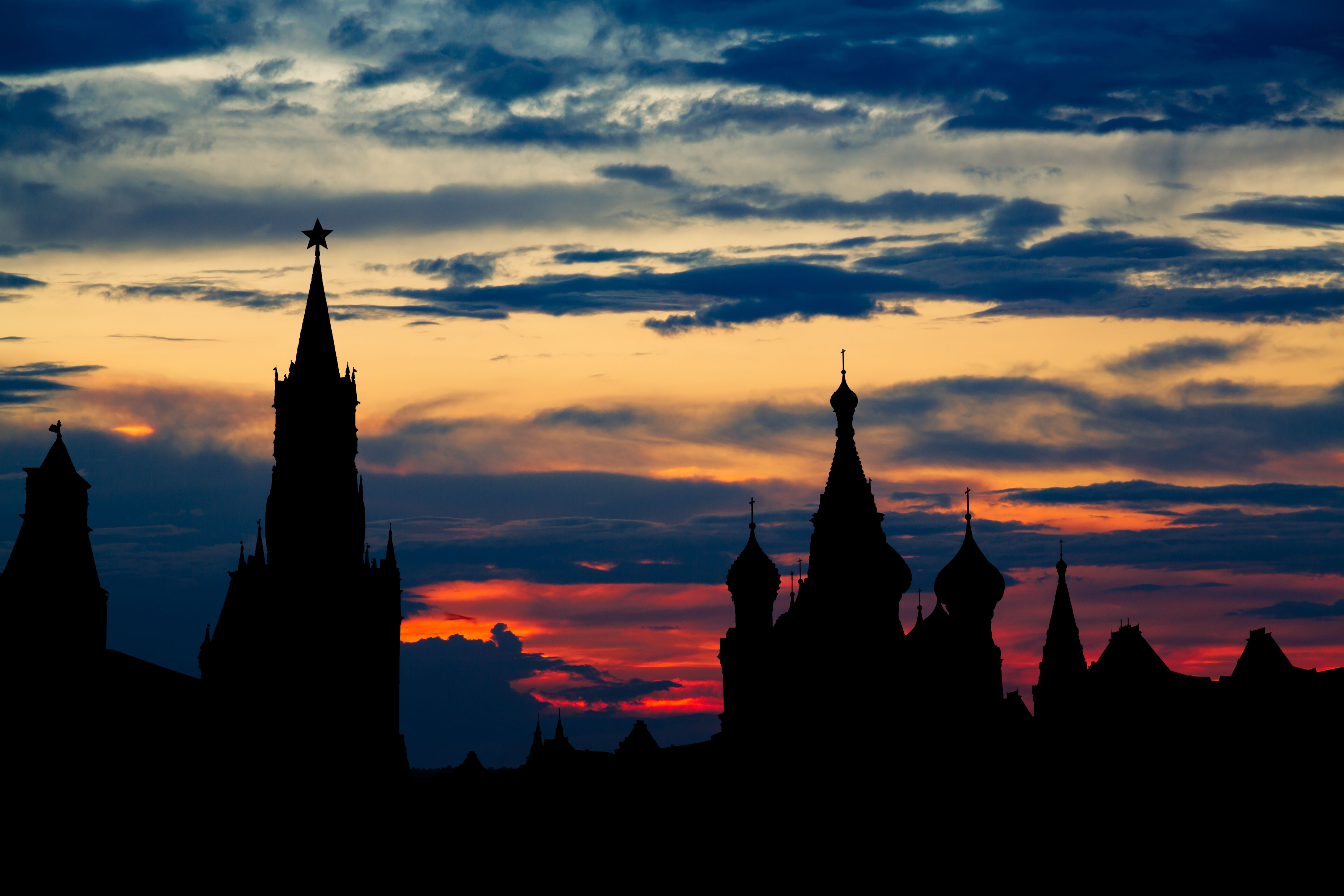 Dramatic silhouette of Moscow's iconic Kremlin towers against a vivid sunset sky. (Photo by Vitaly Gariev on Pexels)