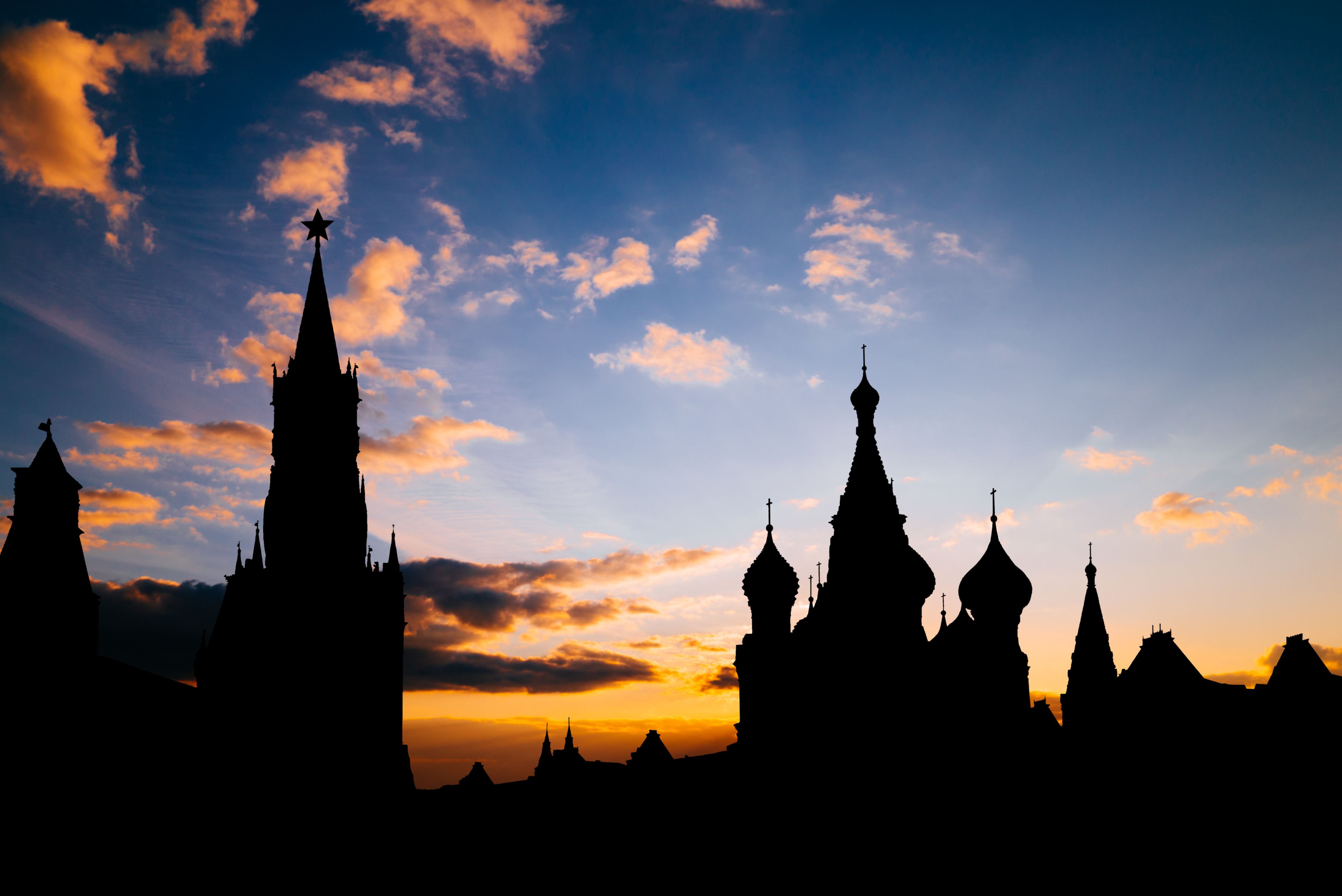 The silhouette of Saint Basil's Cathedral at sunset in Moscow, Russia.
