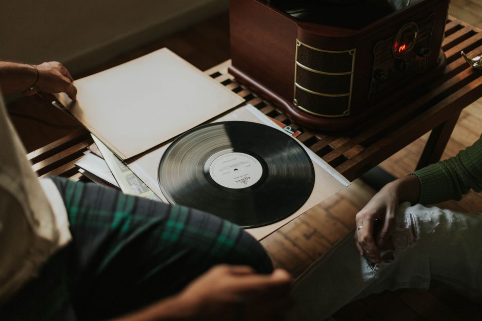 Y2K Revival decor style interior — A cozy setting featuring a vintage vinyl record player and album selection.
