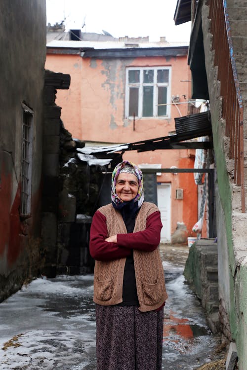 Adult Woman Wearing Headscarf Standing Near Buildings