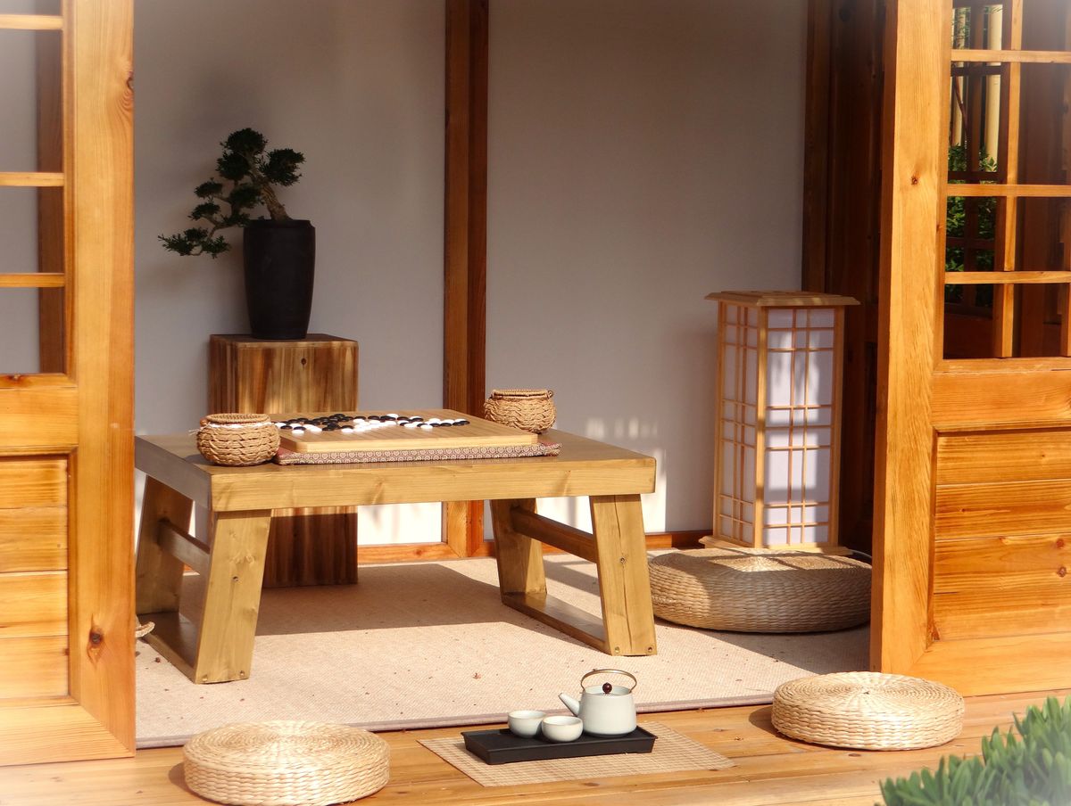 Traditional Japanese ryokan tea room interior with tatami mats