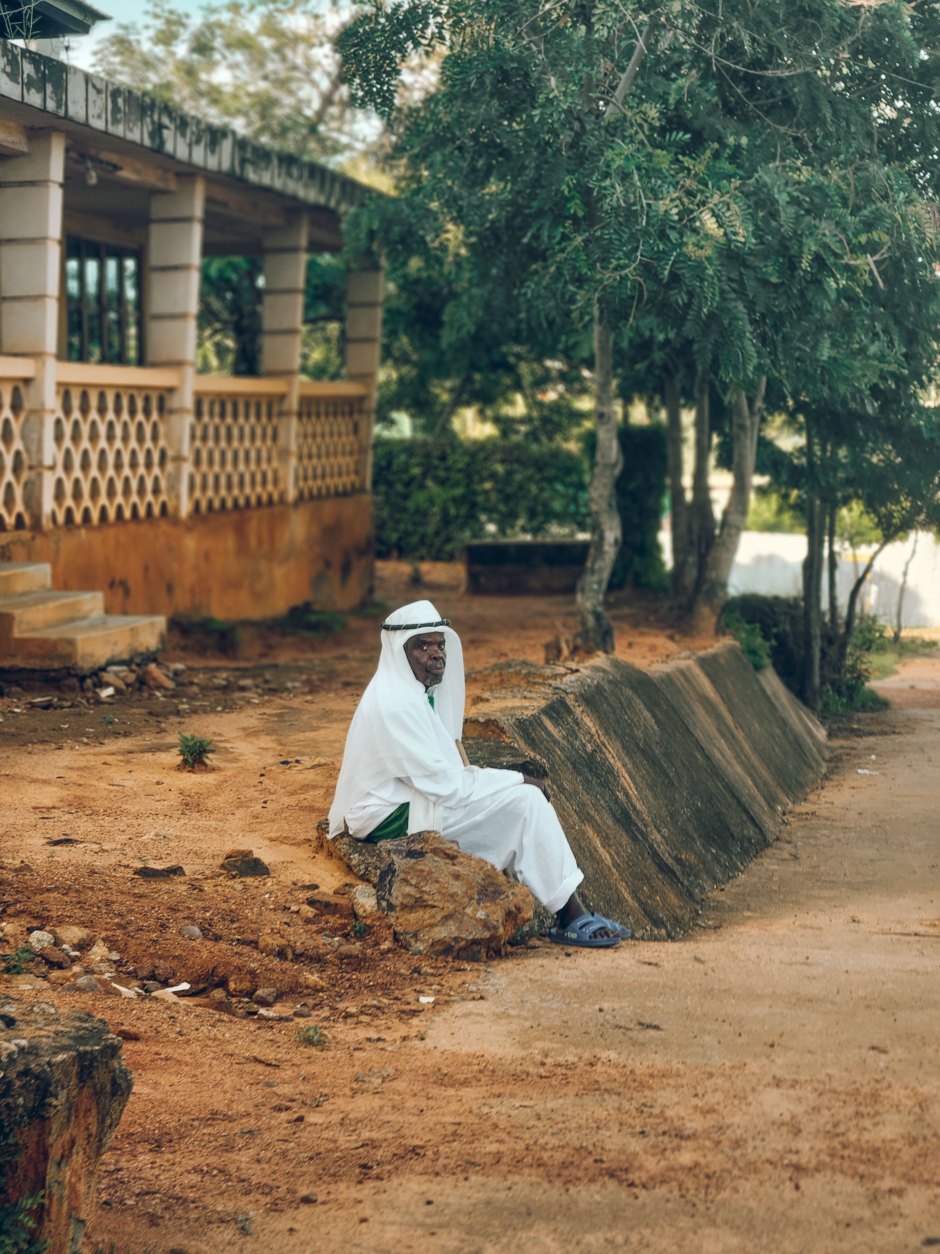 Elderly Man in Traditional Attire Outdoors · Free Stock Photo