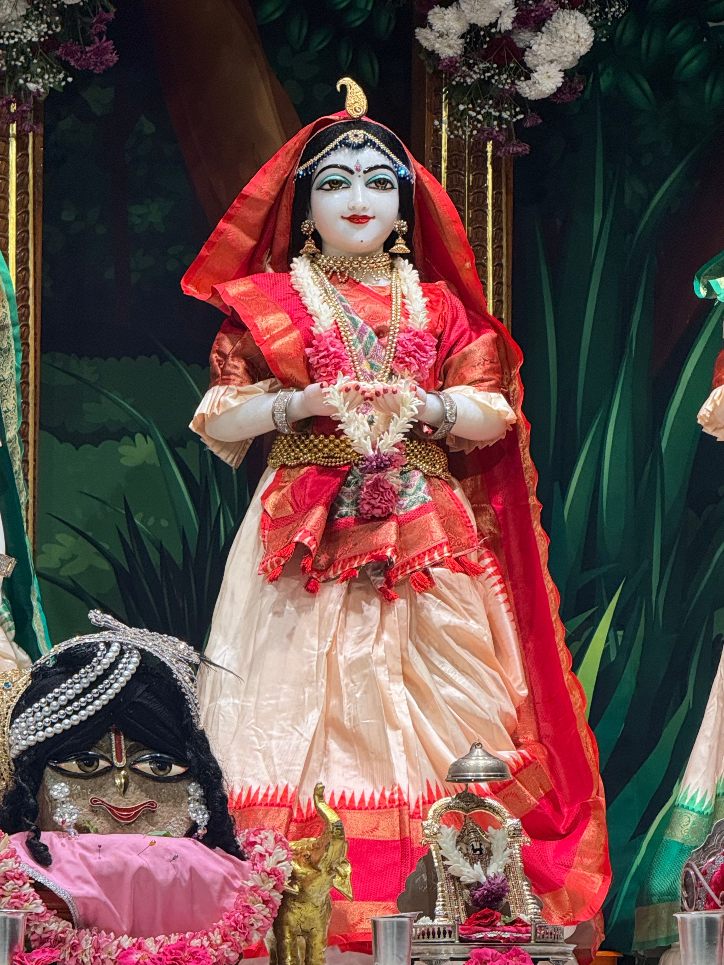 Colorful traditional Indian statue displayed with intricate clothing and decorations in Tirupati, AP, India.