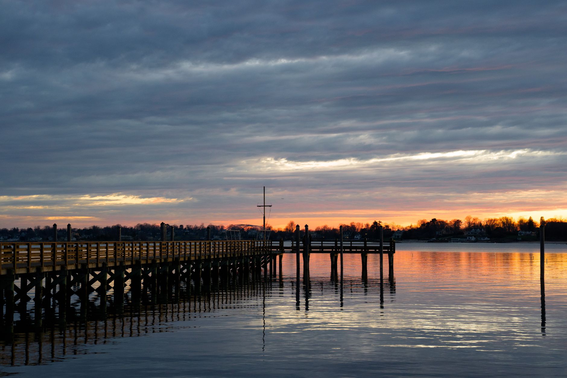 A beautiful sunset view at the Norwalk Pier, capturing the tranquil twilight colors over the water.