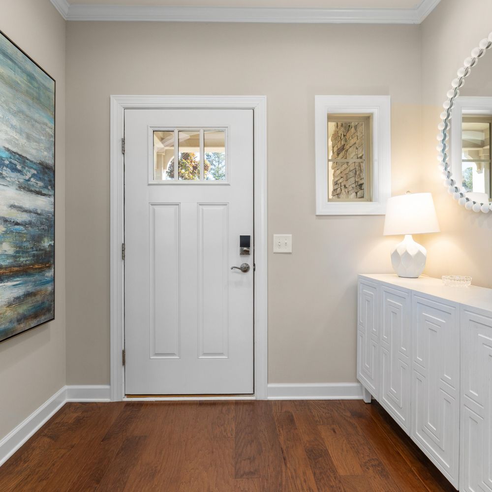 House Painting in Haggerston — clean edges cut in around trim and sockets