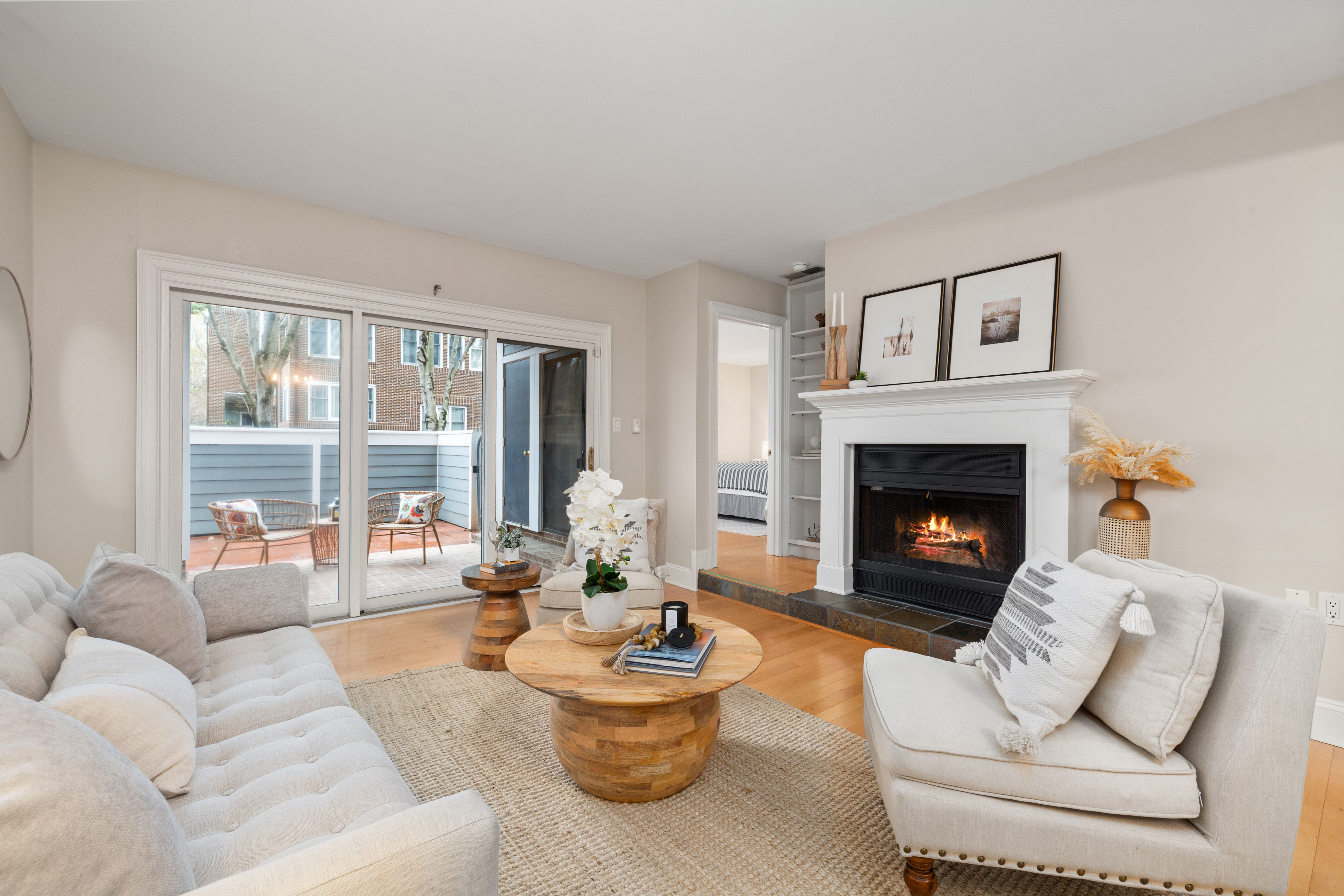 Elegant living room featuring a modern fireplace and outdoor access.