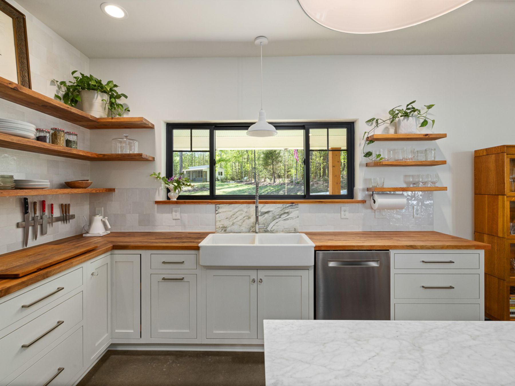 Kitchen Spraying in Hanworth — careful masking before painting begins