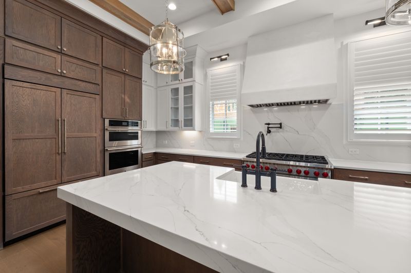 Slate Blue Cabinets with Gray Tile Flooring