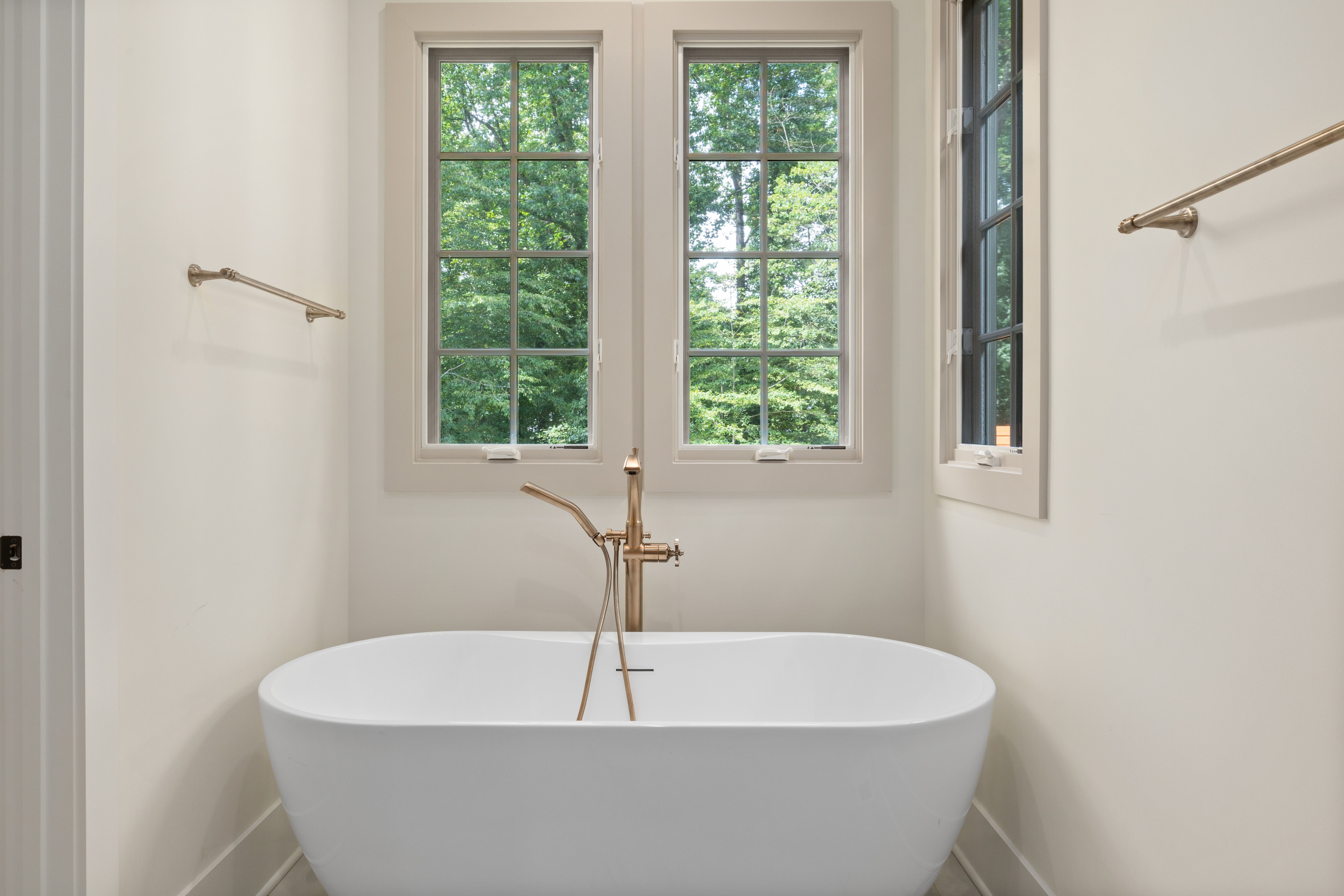 Desert modern freestanding bathtub with natural light, Joshua Tree bathroom remodel