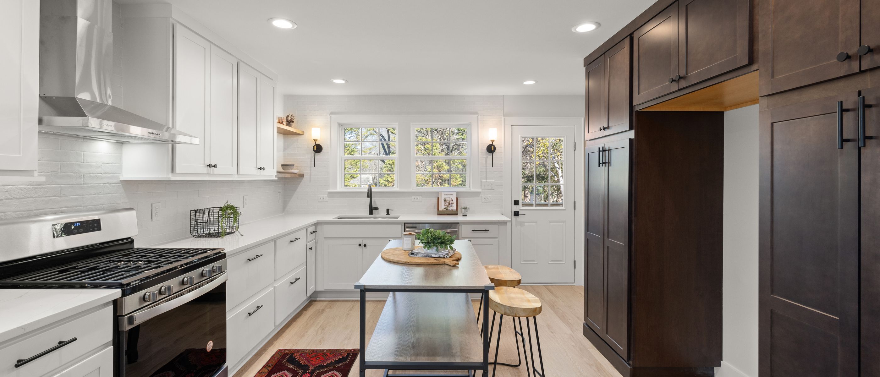 Kitchen Spraying in Heston — a decorator at work mid-project
