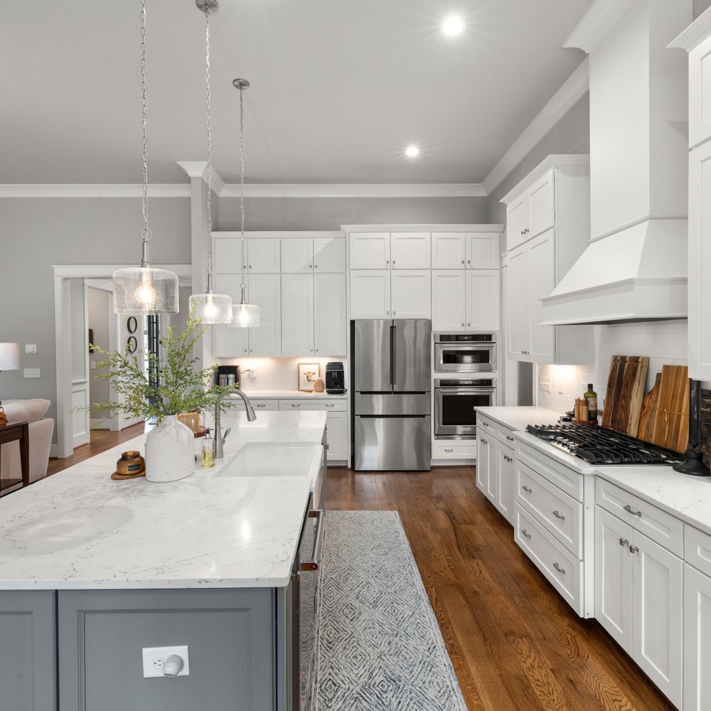 Kitchen Spraying in Blackwall — careful masking before painting begins