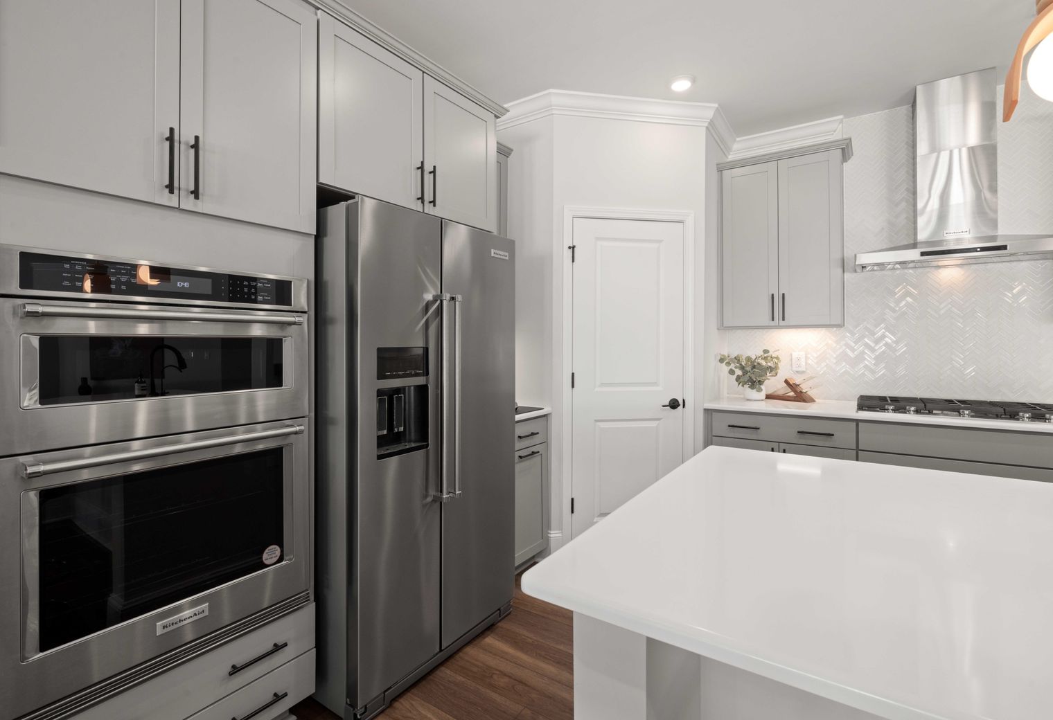 Kitchen Spraying in Leamouth — careful masking before painting begins