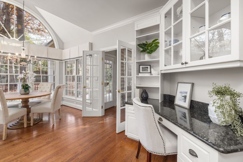 small desk nook at the top of a staircase landing