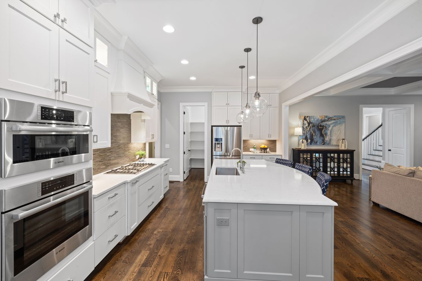 Modern white kitchen cabinets with central island