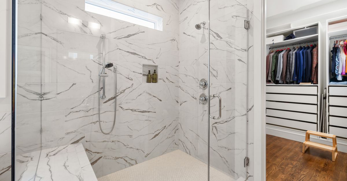 Custom tile shower remodel with glass enclosure in Downtown San Bernardino