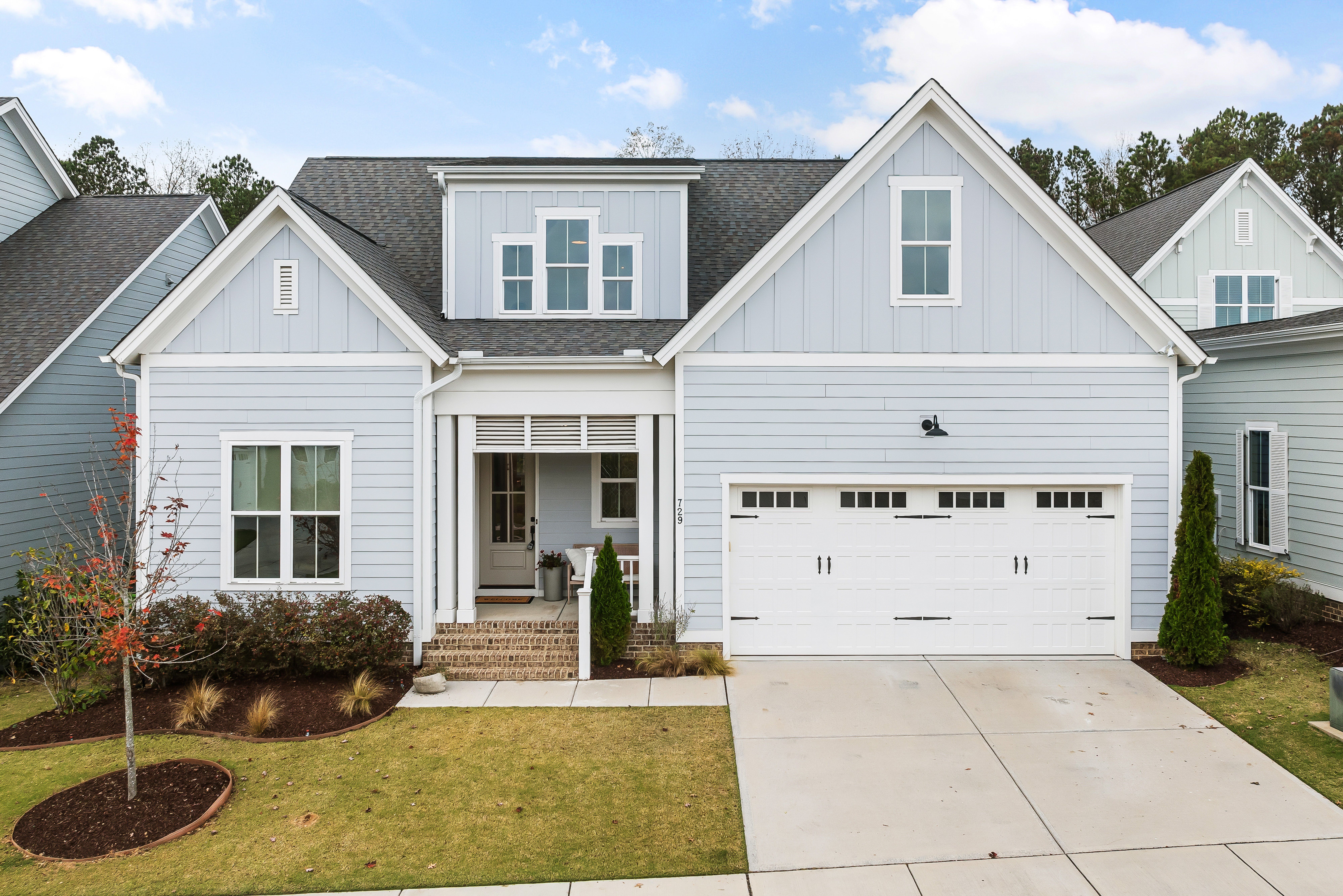 White sectional garage door on a newer residential home