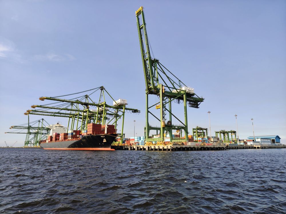 Container ship and port cranes