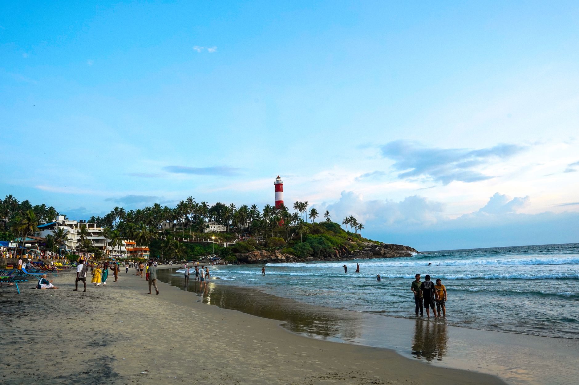 Kovalam's lighthouse over the beach - the day trip most groups build their coastal day around