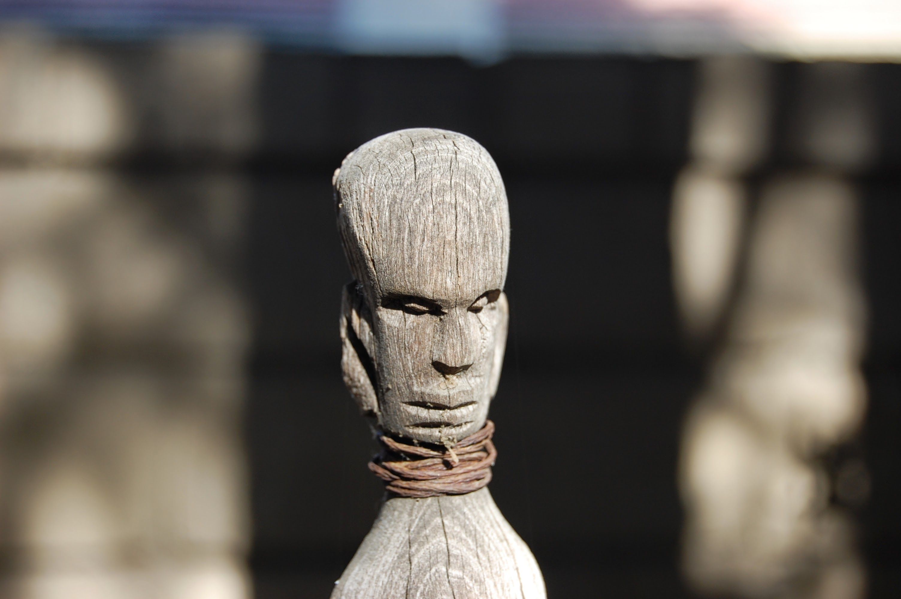 Traditional hand-carved wooden bulul figurine from Baguio, Philippines