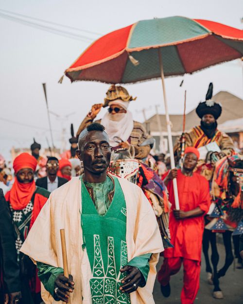 Free Vibrant traditional Nigerian Durbar festival featuring riders in colorful attire and cultural celebrations. Stock Photo
