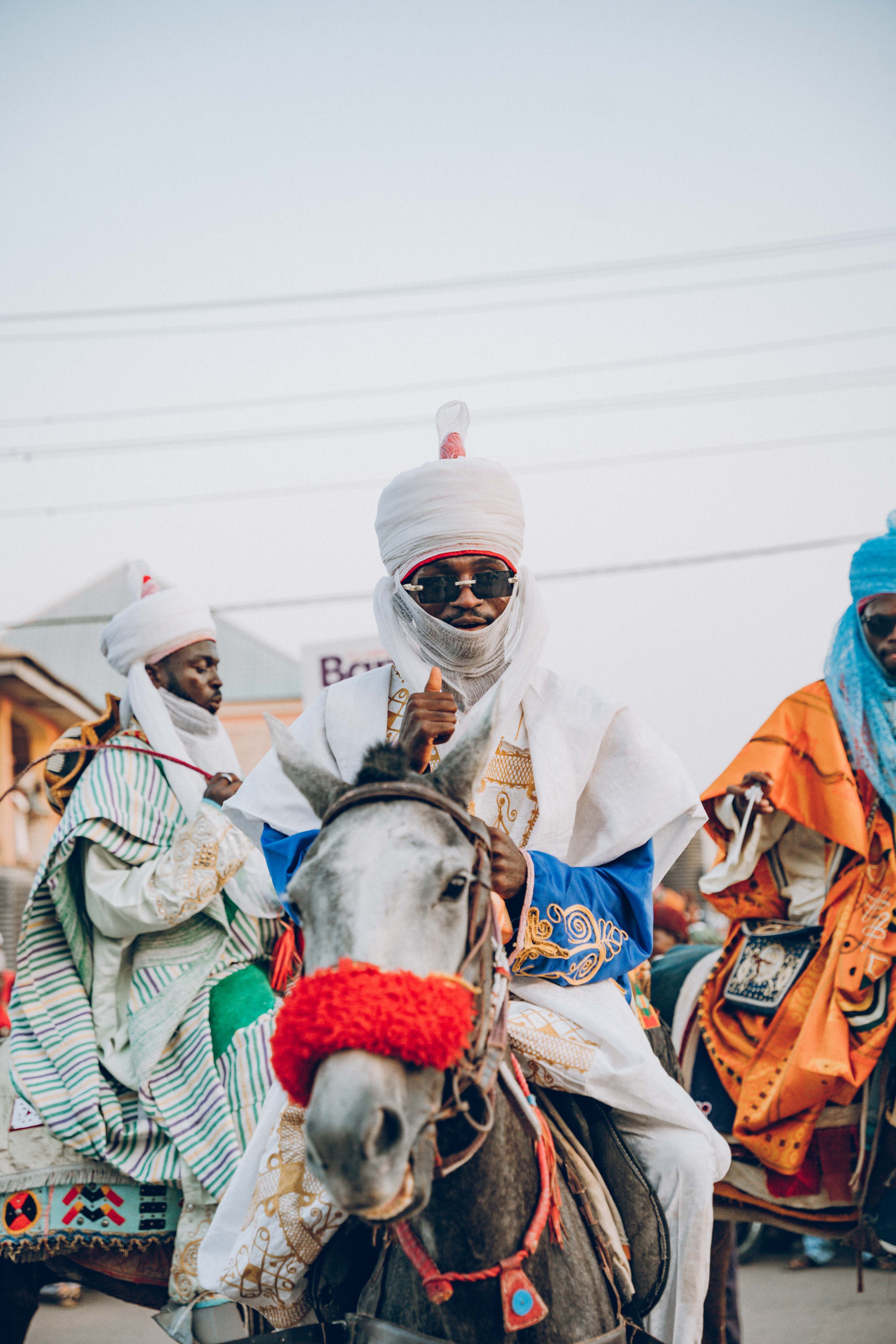 Traditional Horse Riders in Colorful Attire · Free Stock Photo
