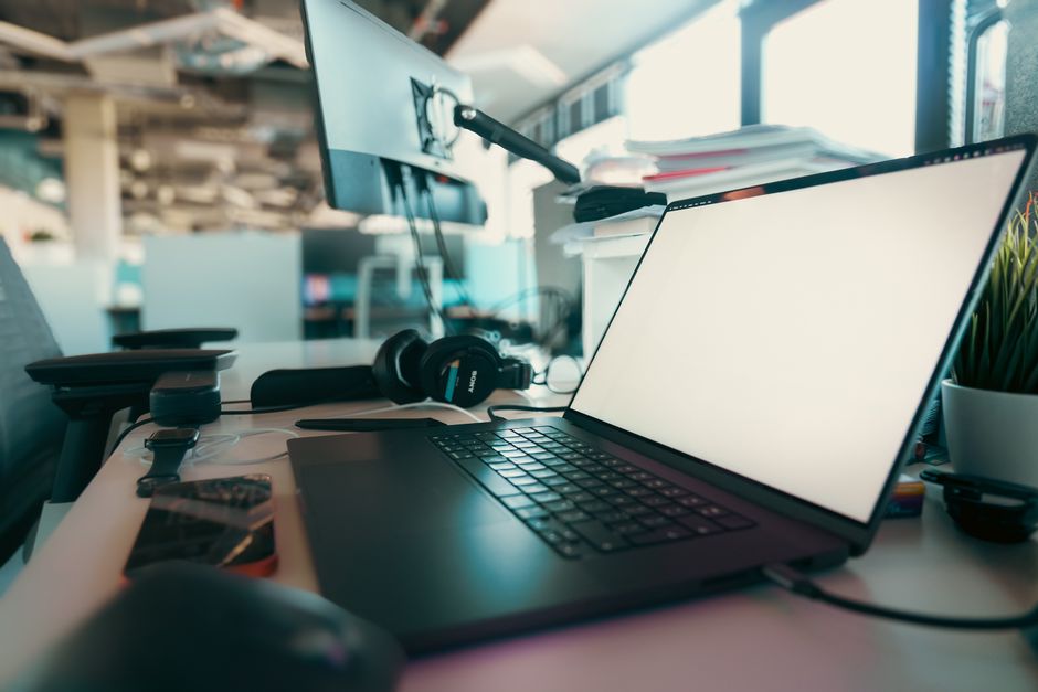 Brave vs Firefox vs Tor: Which Privacy Browser Stops Tracking Best? A contemporary office desk setup featuring a laptop, monitor, and headphones for a productive work environment.