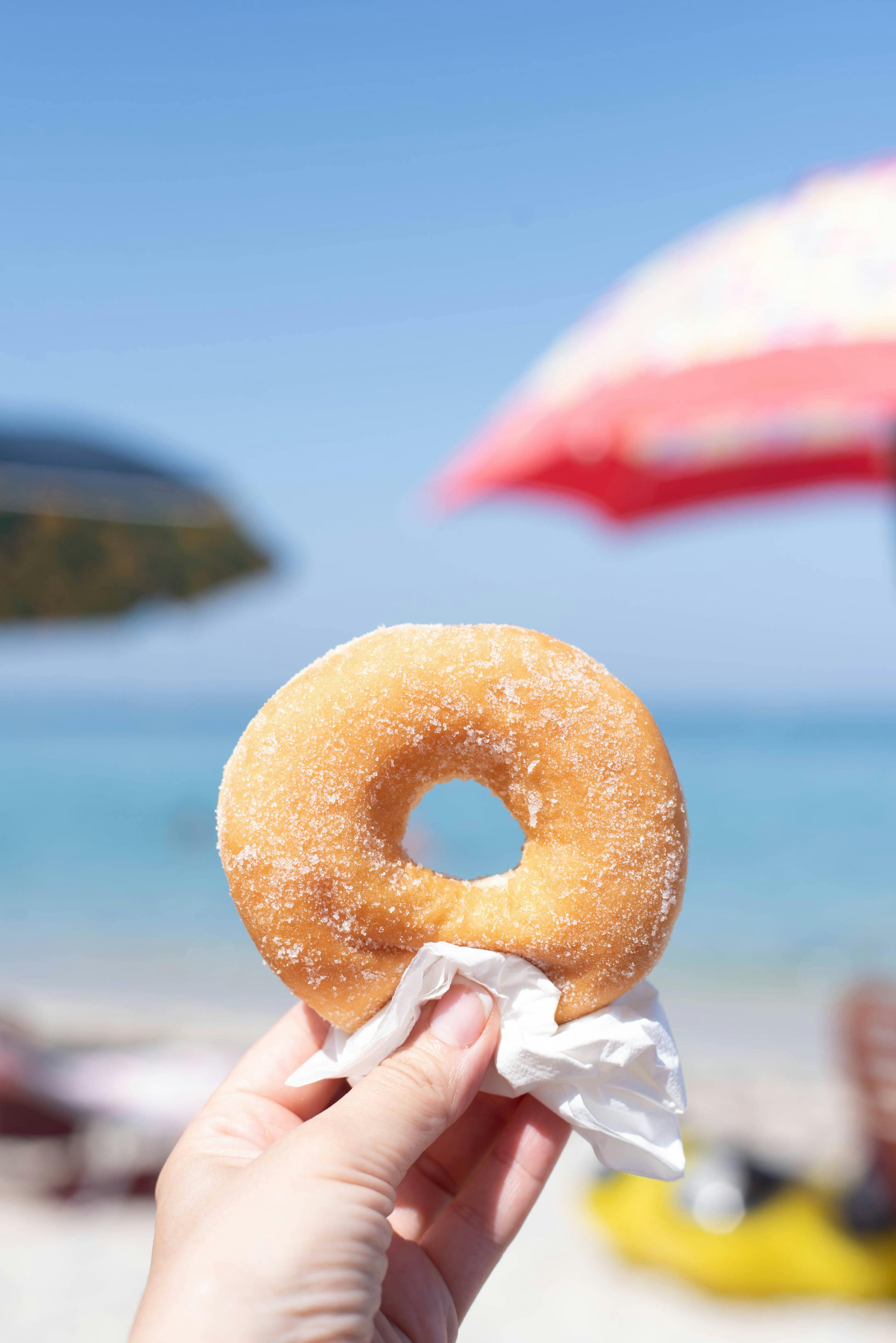Graffe napoletane fritte soffici ricoperte di zucchero semolato