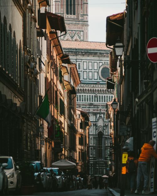 Free View down a narrow Florence street leading to the Florence Cathedral, Italy. Stock Photo