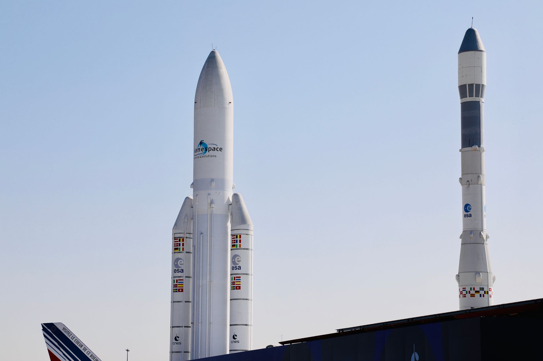 Elevated view of space rockets at Le Bourget Air Show in France on a clear day.