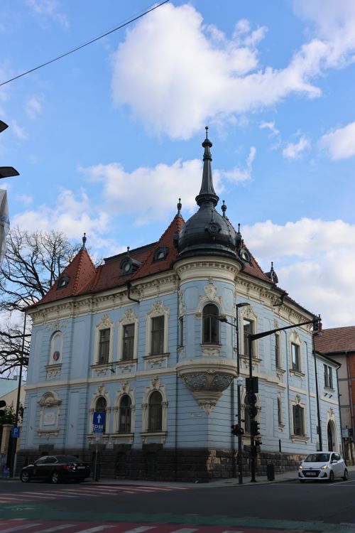 Free Elegant corner building with ornate architecture in Cluj-Napoca, Romania. Stock Photo