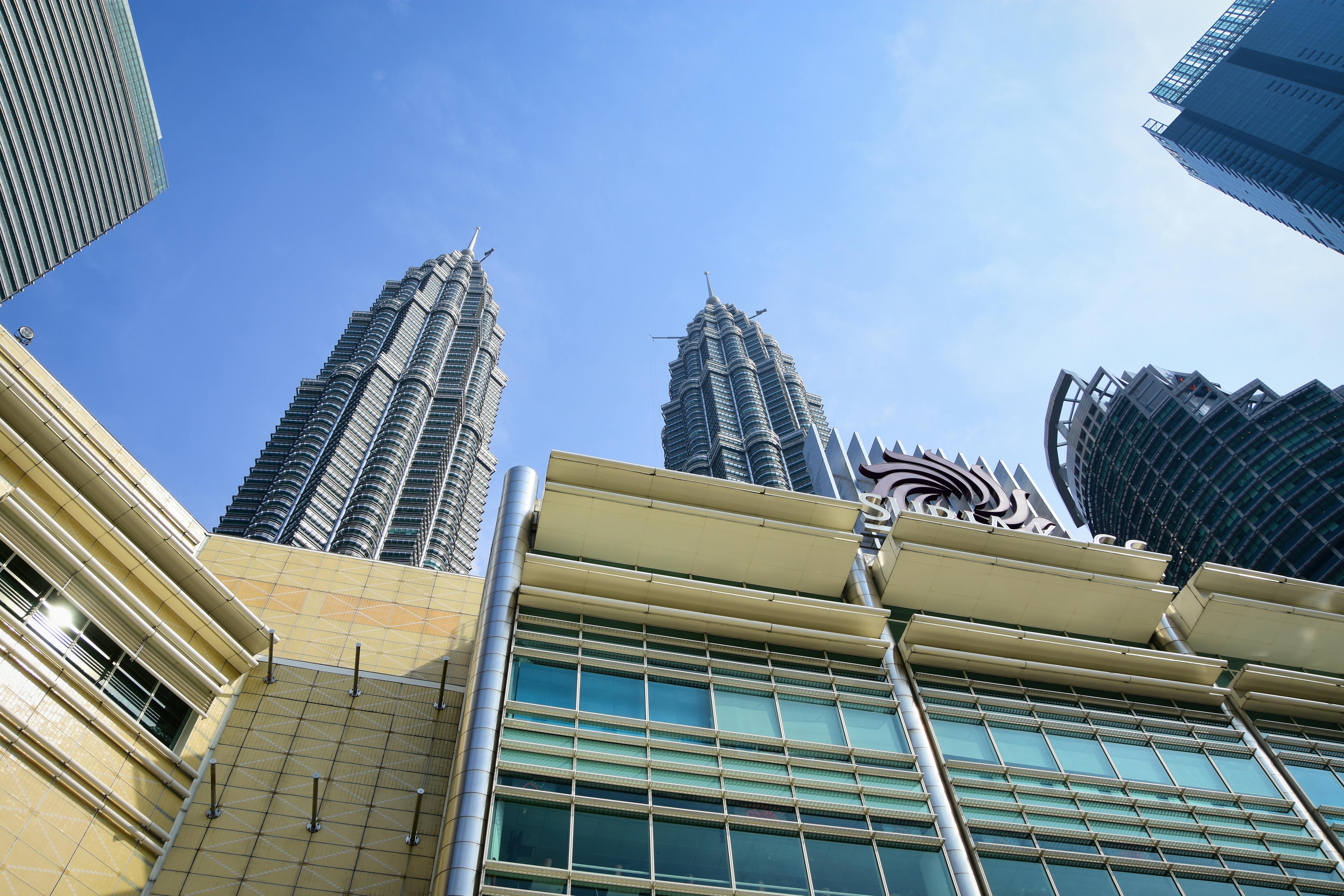 Kuala Lumpur cityscape with Petronas Towers at dusk