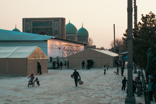 Beautiful scene capturing Islamic architecture and daily life in Uzbekistan.