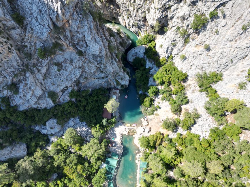 A breathtaking aerial shot of the picturesque Goynuk Canyon in Antalya, Turkey, showcasing the rugged cliffs and vibrant waters.