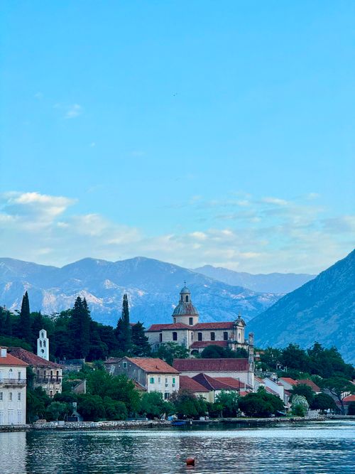 Free Picturesque view of Perast with historic architecture against beautiful mountains in Montenegro. Stock Photo