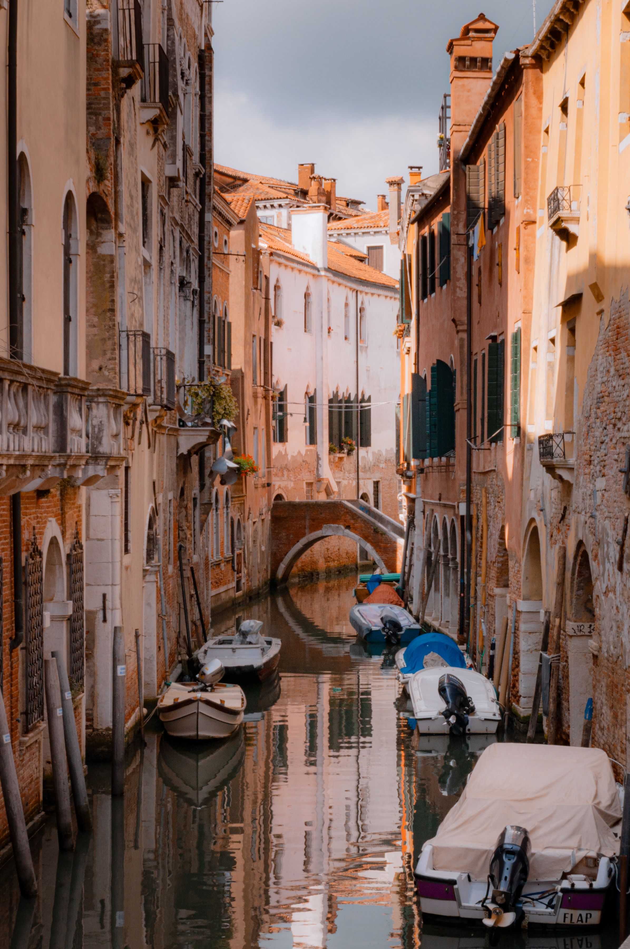 Discover the picturesque canals of Venice, featuring classic architecture and serene waters.