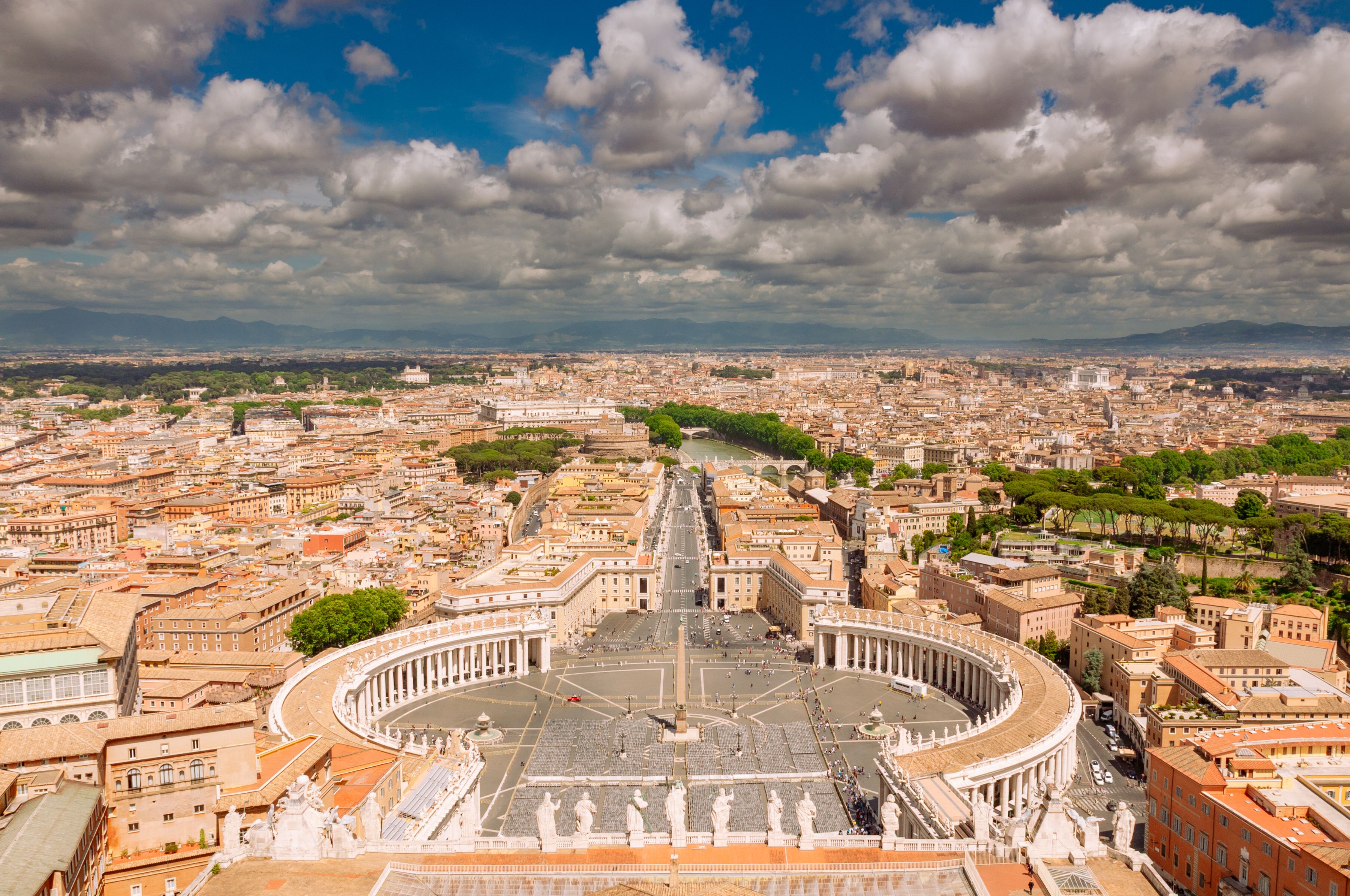 St. Peter's Square at the Vatican in Rome, wide aerial panoramic view with the basilica dome